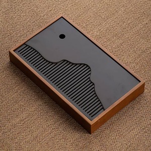 Heat-producing square bamboo tea board with brown color.